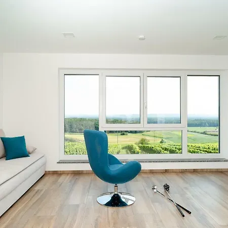 Апартаменты Ferienhaus Im Weingarten *